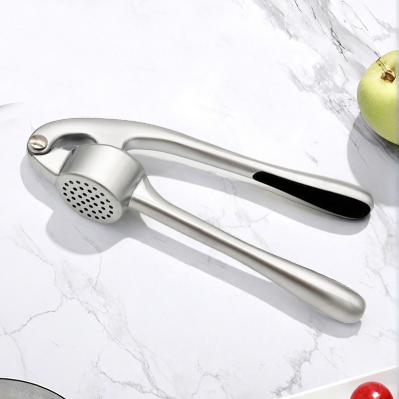 مكبس ثوم يدوي - أداة منزلية له - مراجعة Kitchen Gadgets Made In Usa وسعره